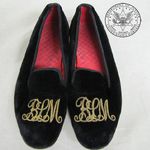 Black velveteen slippers, size 8Â½, red quilted lining, âBLMâ embroidered with gold thread.